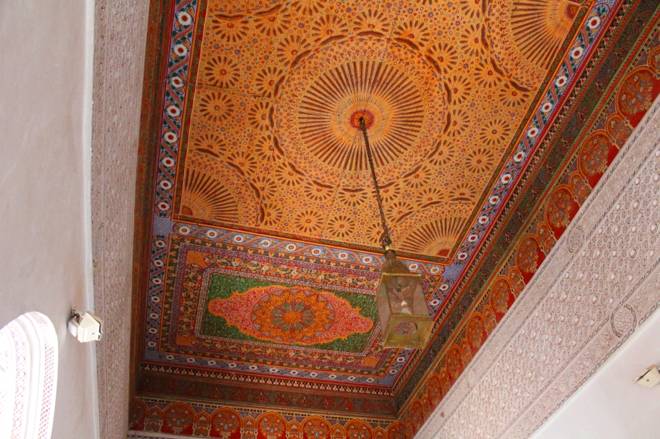 The mosaic tiles in the ceiling are works of art in that the pattern and color have so much detail in them.